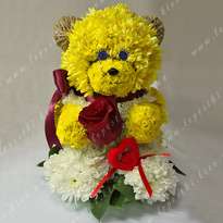 "Flower bear with a heart"