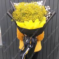 Bouquet of yellow gypsophila