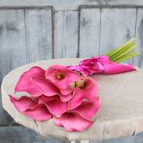9 pink calla lilies