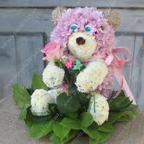Рожевий ведмедик з квітів